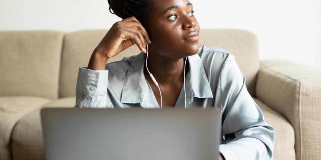 woman working from laptop working mother mom