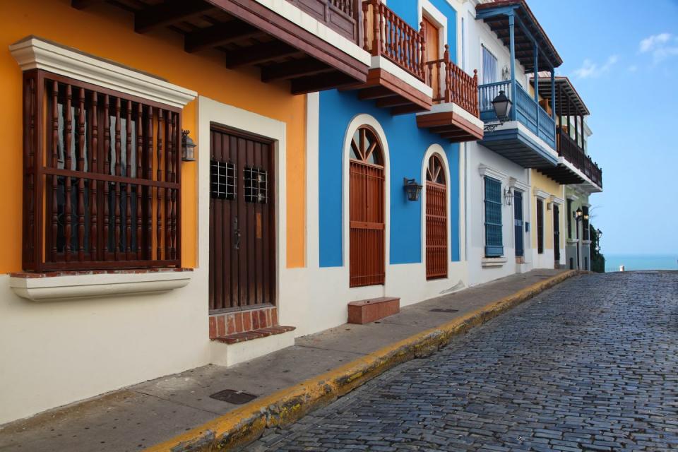 <p>Depending on where you're flying from, flights to San Juan will cost you as little as <a href="https://www.cheapflights.com/flights-to-puerto-rico/" rel="nofollow noopener" target="_blank" data-ylk="slk:$100 per person;elm:context_link;itc:0;sec:content-canvas" class="link ">$100 per person</a> right now. Generally, the best time to fly to the island is in January, but February and March are also good months to visit. Check out <a href="https://www.tripadvisor.com/Hotel_Review-g1006845-d1984406-Reviews-Hacienda_Siesta_Alegre-Rio_Grande_Puerto_Rico.html" rel="nofollow noopener" target="_blank" data-ylk="slk:Hacienda Siesta Alegre;elm:context_link;itc:0;sec:content-canvas" class="link ">Hacienda Siesta Alegre</a> for a hotel that oozes Puerto Rican culture and affordability. Fly into San Juan and explore historical sites like Old San Juan, Castillo San Felipe del Morro and North America's only rainforest, <a href="https://www.harpersbazaar.com/culture/travel-dining/g7171/most-beautiful-places-in-the-world/" rel="nofollow noopener" target="_blank" data-ylk="slk:El Yunque;elm:context_link;itc:0;sec:content-canvas" class="link ">El Yunque</a>. </p>