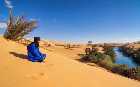 Desert oases are amongst Libya's charms, but they remain off limits to tourists - Credit: ISTOCK