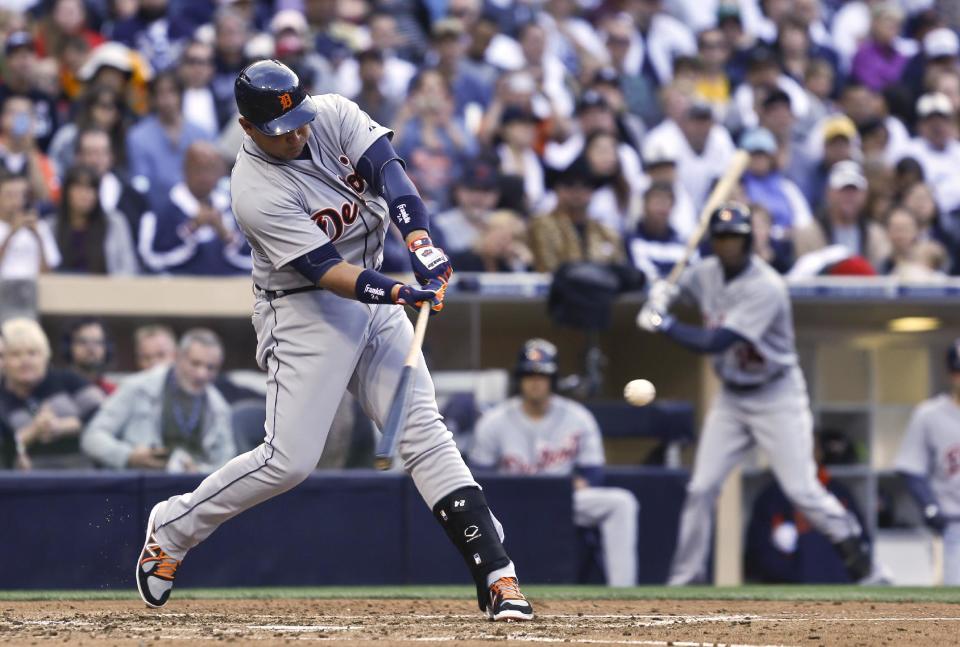 Detroit Tigers' Miguel Cabrera drives a double to the left field corner to drive in Ian Kinsler in the third inning of a baseball game against the San Diego Padres Saturday, April 12, 2014, in San Diego. (AP Photo/Lenny Ignelzi)