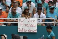 <p>A Miami Dolphins fan holds a sign paying respects to Miami Marlins pitcher Jose Fernandez during the game against the Cleveland Browns on September 25, 2016 in Miami Gardens, Florida. (Photo by Eric Espada/Getty Images) </p>