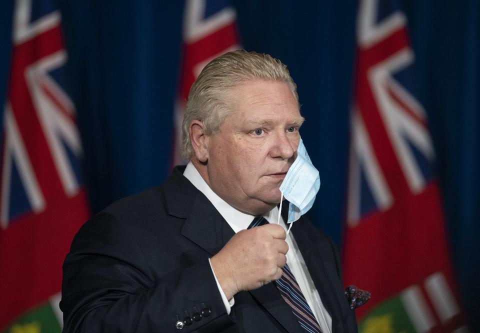 <span class="caption">Ford arrives to a news conference at the Ontario legislature on the easing of restrictions during the COVID-19 pandemic in Toronto in January 2022.</span> <span class="attribution"><span class="source">THE CANADIAN PRESS/Nathan Denette</span></span>