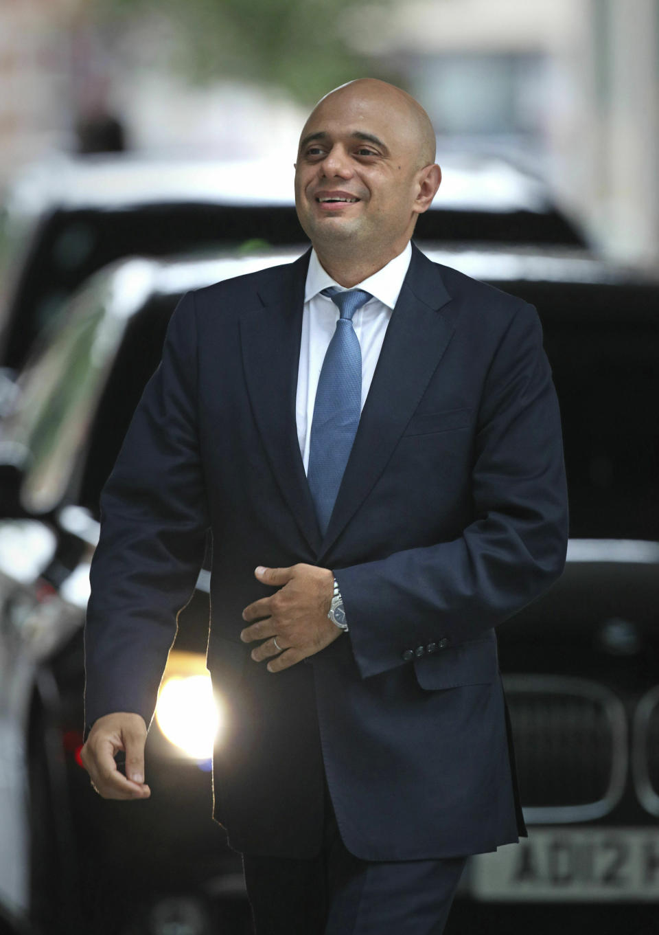 Conservative Party leadership contender Sajid Javid arrives for a live TV debate with other contenders Tuesday June 18, 2019. Britain's Conservative Party will continue to hold elimination votes until the final two contenders will be put to a vote of party members nationwide, with the winner due to replace Prime Minister Theresa May as party leader and prime minister. (Yui Mok/PA via AP)