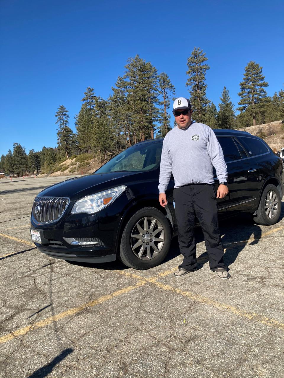 Tyler Arciaga of San Diego had to drive 100 miles for a 2017 Buick Enclave he bought used in October 2020 because new vehicles were too expensive.