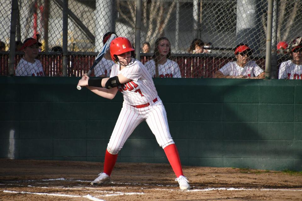 Lodi's Allison Frank swings her bat looking for a hit during one of the Flames softball games during the 2023-24 season.