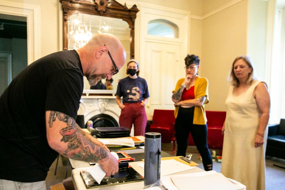 Rich Dana does a demonstration during a Cheap Copies class at the Close House Public Space One location in Iowa City last month. For 20 years, Public Space One has been helping connect artists with the public.