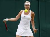 <p>Sabine Lisicki of Germany plays a return to Samantha Stosur of Australia during their women’s singles match on day four of the Wimbledon Tennis Championships in London, Thursday, June 30, 2016. (AP Photo/Ben Curtis)</p>