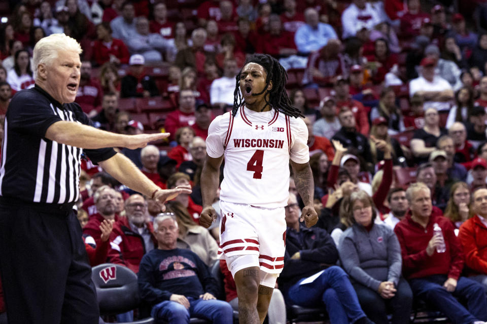 Wisconsin guard Kamari McGee (4) reacts during the second half of the team's NCAA college basketball game against Robert Morris in Madison, Wis., Friday, Nov. 17, 2023. (Samantha Madar/Wisconsin State Journal via AP)