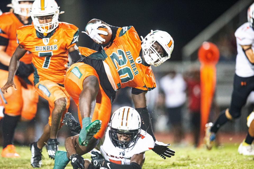 DunbarÕs David Perkins runs for yards during a playoff game against Lely at Dunbar on Friday, Nov. 11, 2022. Dunbar won 21-7 and moves on.  