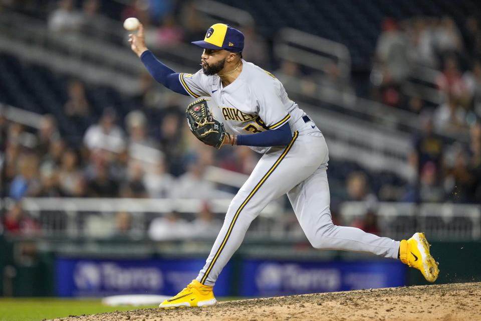 FILE - Milwaukee Brewers relief pitcher Devin Williams throws during the ninth inning of the team's baseball game against the Washington Nationals at Nationals Park, Aug. 1, 2023, in Washington. The Brewers reached deals with 2021 NL Cy Young Award winner Corbin Burnes, two-time All-Star closer Williams and shortstop Willy Adames on Thursday, Jan. 11, 2024, to avoid going to arbitration with all three players. (AP Photo/Alex Brandon, File)