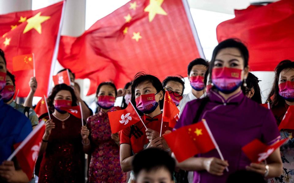 President Xi Jinping hailed China's rule over Hong Kong as he lead 25th anniversary celebrations of the city's handover from Britain on July 1, - ISAAC LAWRENCE / AFP 