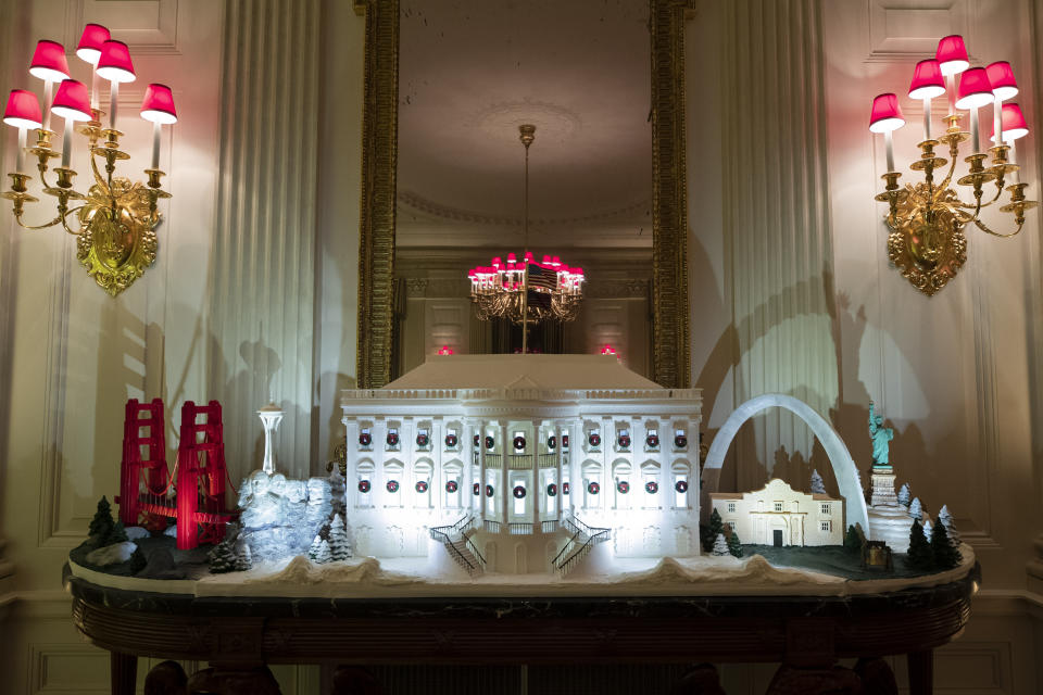 The White House made of gingerbread also features landmarks from around the country in the State Dinning Room during the 2019 Christmas preview at the White House, Monday, Dec. 2, 2019, in Washington. | AP—Copyright 2019 The Associated Press. All rights reserved.