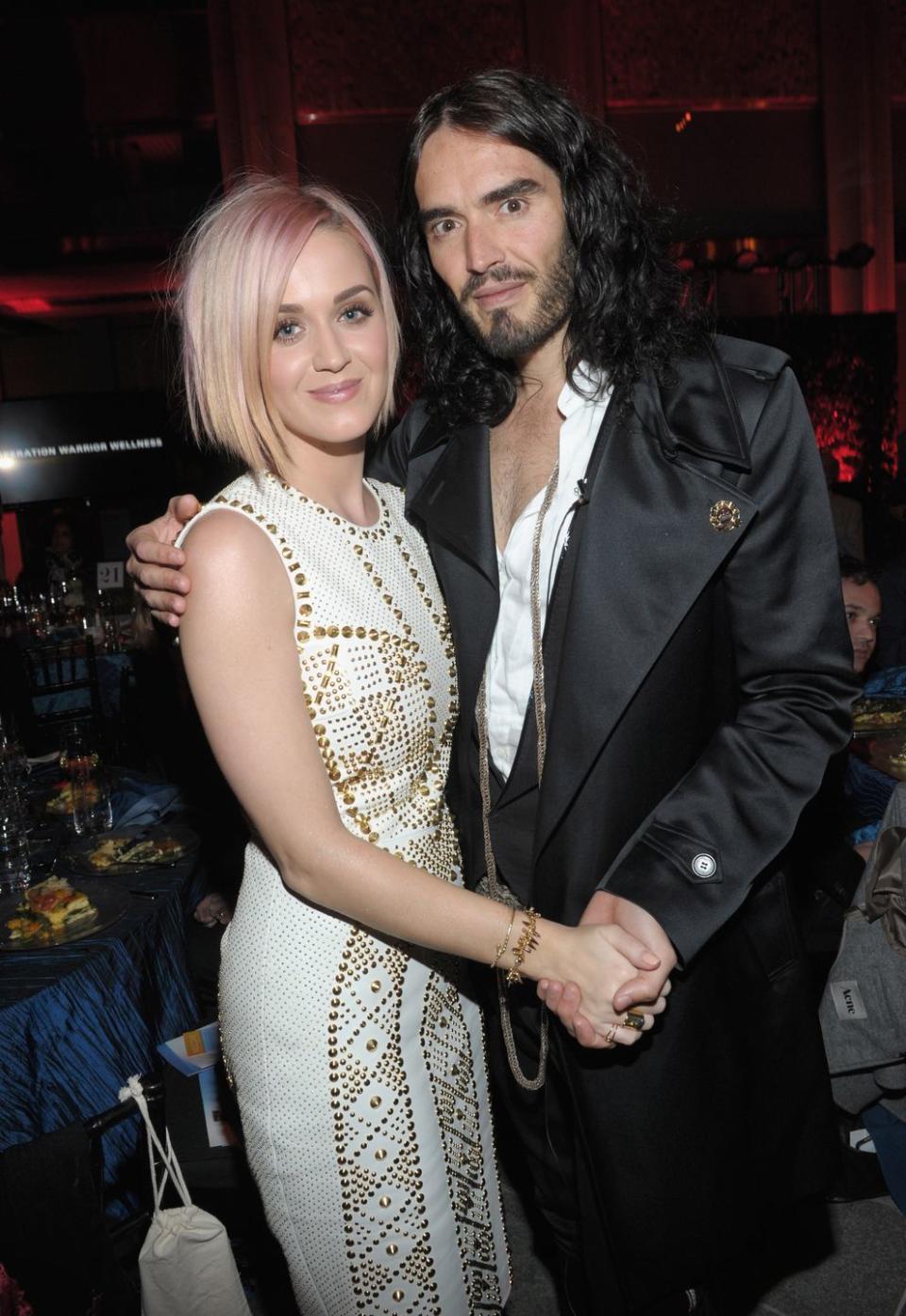 los angeles, ca december 03 singer katy perry l and actor russell brand attend the 3rd annual change begins within benefit celebration presented by the david lynch foundation held at lacma on december 3, 2011 in los angeles, california photo by michael bucknerwireimage