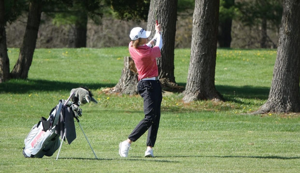 Carter Klawonn, shown during a match last season, tied with teammate Taleon Guess for third place individually to lead Bedford to the championship of the Tecumseh Invitational Monday.