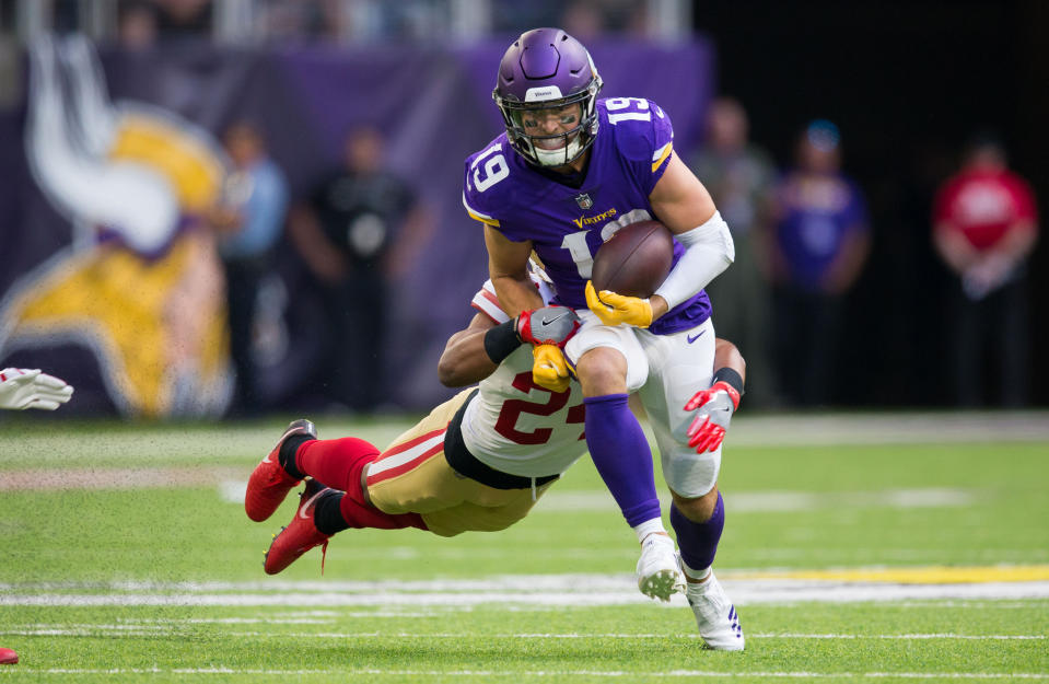 <p>Minnesota Vikings wide receiver Adam Thielen (19) runs after the catch in the first quarter against San Francisco 49ers defensive back K’Waun Williams (24) at U.S. Bank Stadium. Mandatory Credit: Brad Rempel-USA TODAY Sports </p>