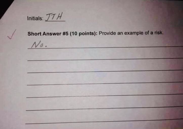 Test paper with initials JTH. The question asks to provide an example of a risk. The response given is: "No."