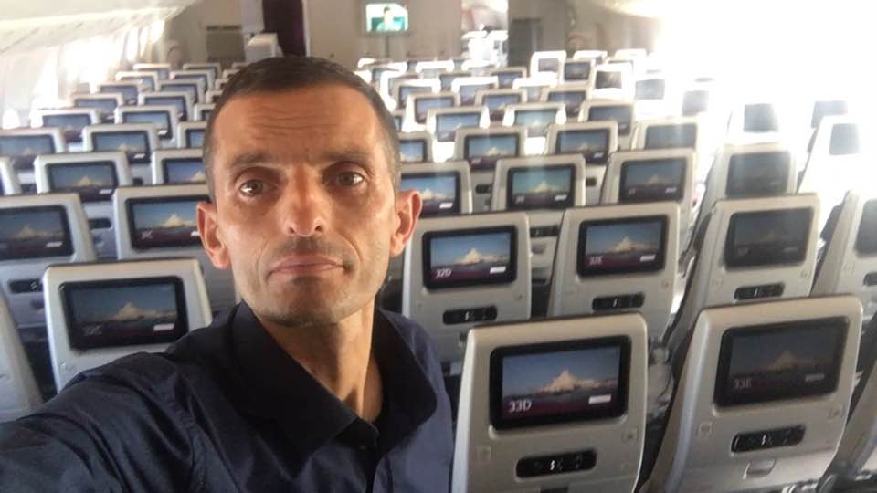 Albion Haxhnikaj is pictured on a Qatar Airways flight from Kosovo to Sydney.
