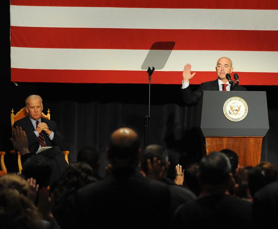 Then-Vice President Joe Biden attends as Alejandro Mayorkas administers the oath of allegiance to new American citizens during a naturalization ceremony on November 14, 2013 in Atlanta, Georgia. / Credit: Chris McKay/WireImage