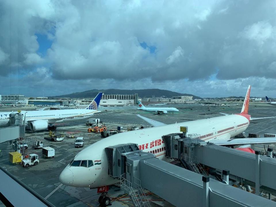 airplane on runway with door