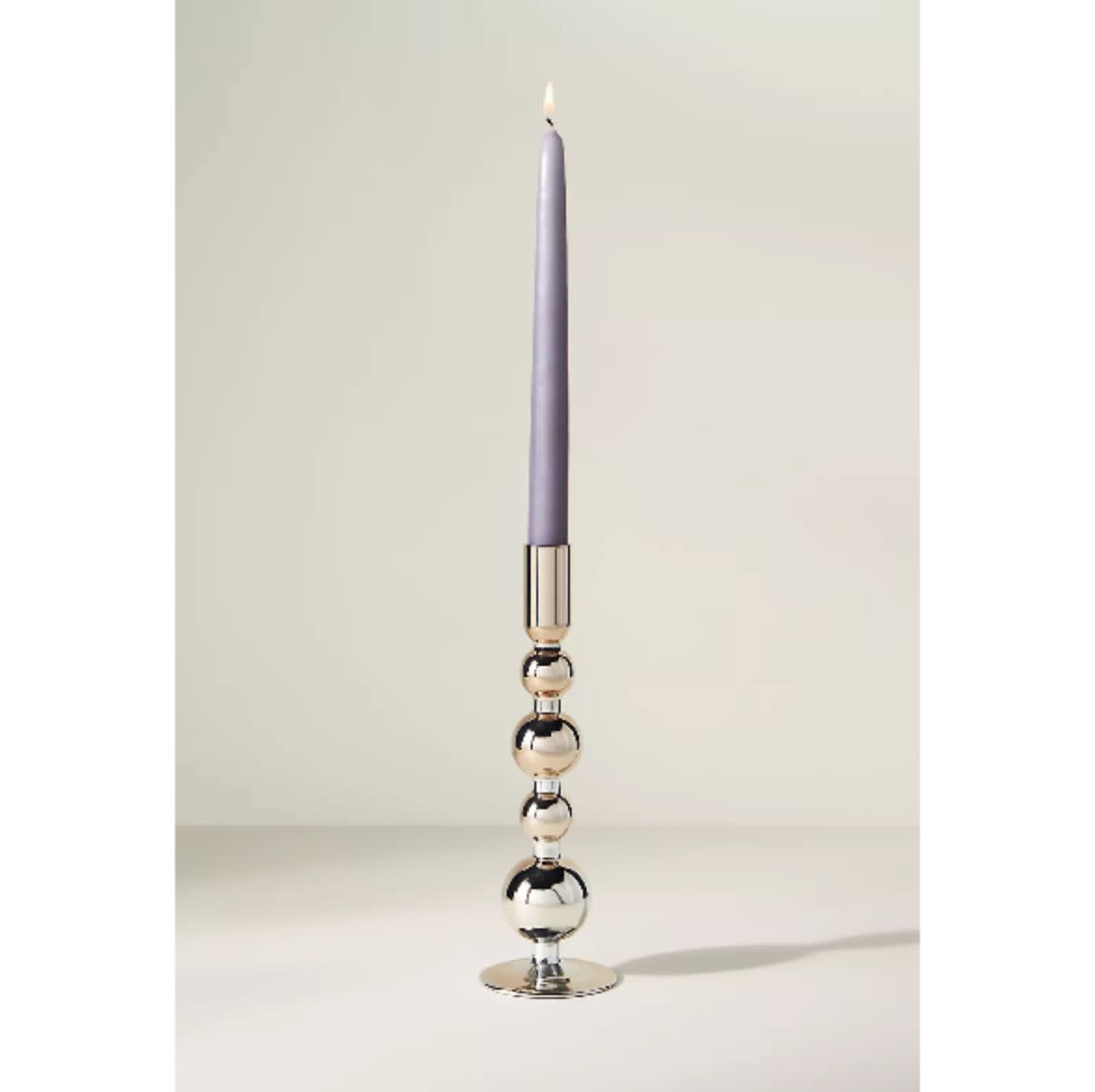 <p><a href="https://go.redirectingat.com?id=74968X1596630&url=https%3A%2F%2Fwww.anthropologie.com%2Fshop%2Fdelaney-candle-holder&sref=https%3A%2F%2Fwww.harpersbazaar.com%2Ffashion%2Ftrends%2Fg4452%2Fgifts-under-100%2F" rel="nofollow noopener" target="_blank" data-ylk="slk:Shop Now;elm:context_link;itc:0;sec:content-canvas" class="link rapid-noclick-resp">Shop Now</a></p><p>Delaney Candle Holder</p><p>anthropologie.com</p><p>$22.00</p><span class="copyright">anthropologie.com</span>