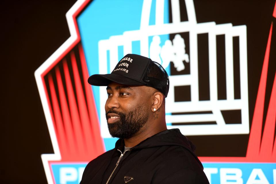 Darrelle Revis answers a question at the Pro Football Hall of Fame, Monday, March 6, 2023.