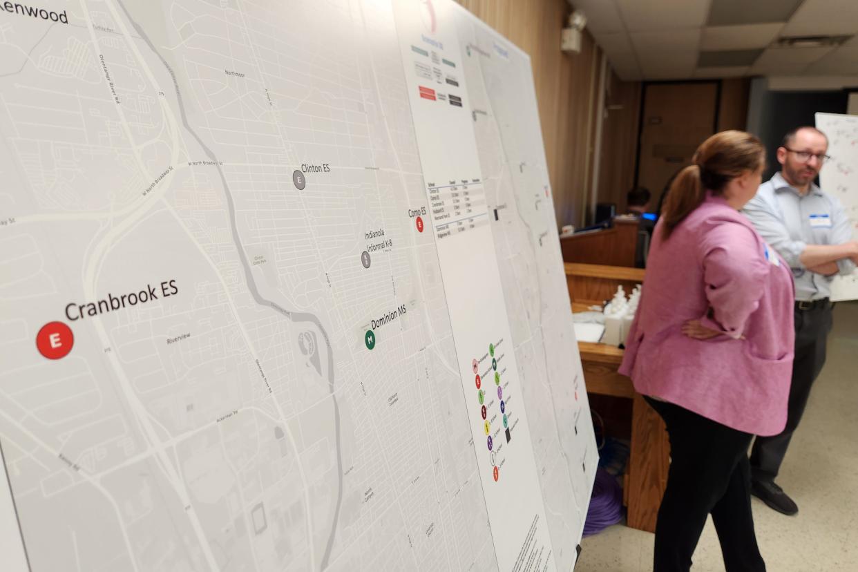 Columbus City Schools maps showing proposed school closure simulations during a Thursday open house walkthrough of the nine proposals from the Superintendent's Community Facilities Task Force, which could close up to 20 schools.