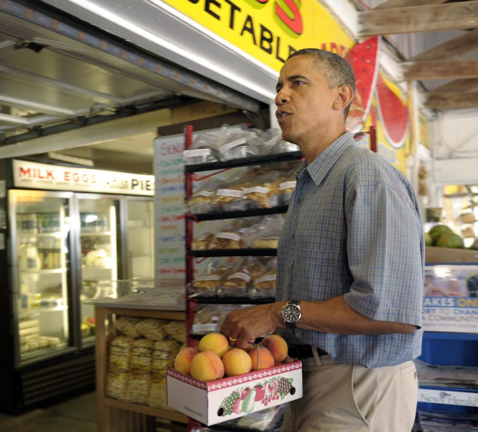 President Barack Obama visits Bergman Orchards Farm Market in Port Clinton, Ohio, Thursday, July 5, 2012. Obama is on a two-day bus trip through Ohio and Pennsylvania. (AP Photo/Susan Walsh)