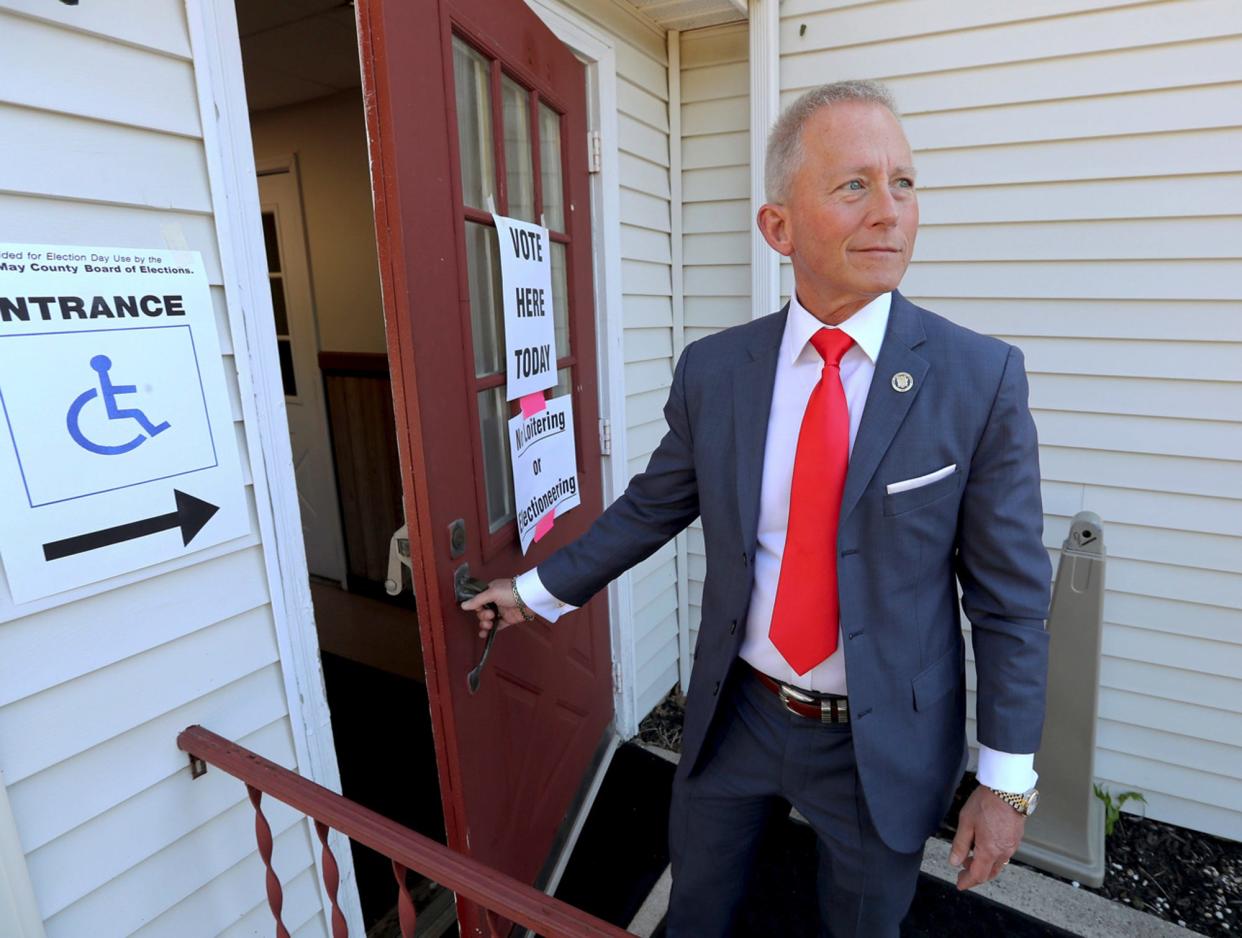 FILE- In this June 5, 2018 file photo, New Jersey State Senator Jeff Van Drew, D-1st, arrives at the Ocean View Fire Hall in Dennis Township, N.J., to cast his vote in the mid-term primary election. Van Drew is running for the House of Representatives in New Jersey's second Congressional District. (Dale Gerhard/The Press of Atlantic City via AP, File)