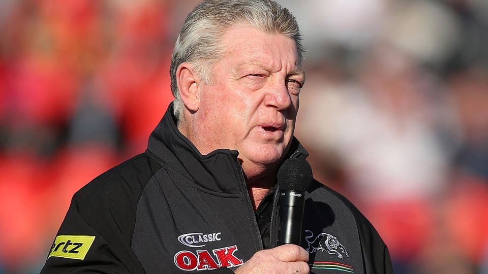 Phil Gould is pictured during an interview on the field.