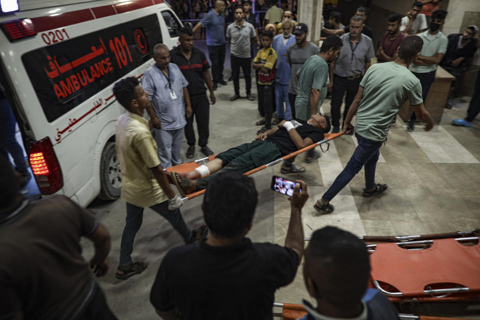 Palestinians wounded in Israeli bombardment of the Gaza Strip are brought to a hospital in Khan Younis, Thursday, June. 27, 2024. (AP Photo/Jehad Alshrafi)