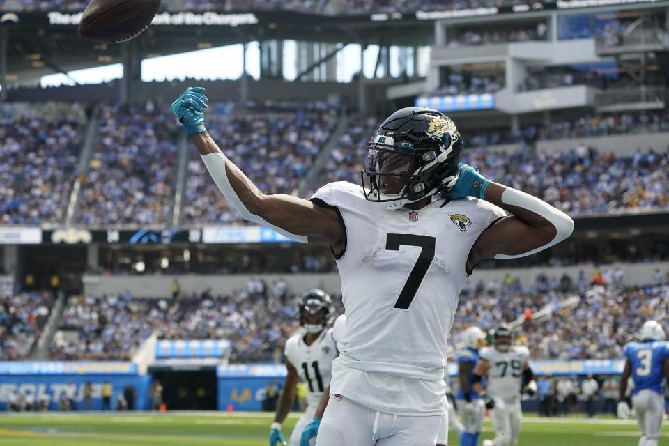 Jacksonville Jaguars wide receiver Zay Jones (7) reacts after scoring against the Los Angeles Chargers during the first half of an NFL football game in Inglewood, Calif., Sunday, Sept. 25, 2022. (AP Photo/Marcio Jose Sanchez)