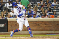 New York Mets' J.D. Davis hits a single during the fourth inning of the team's baseball game against the Toronto Blue Jays, Saturday, July 24, 2021, in New York. (AP Photo/Mary Altaffer)