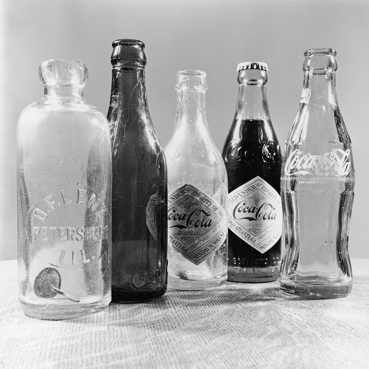 coca cola bottle logo black and white