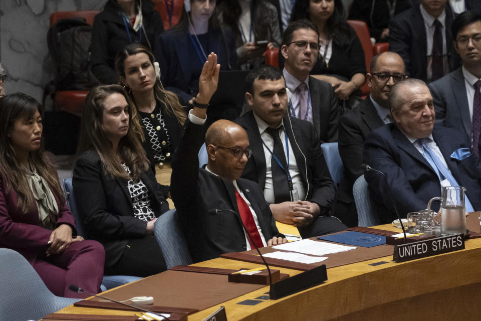 U.S. Deputy Ambassador Robert Wood votes against resolution during a Security Council meeting at United Nations headquarters, Thursday, April 18, 2024. (AP Photo/Yuki Iwamura)