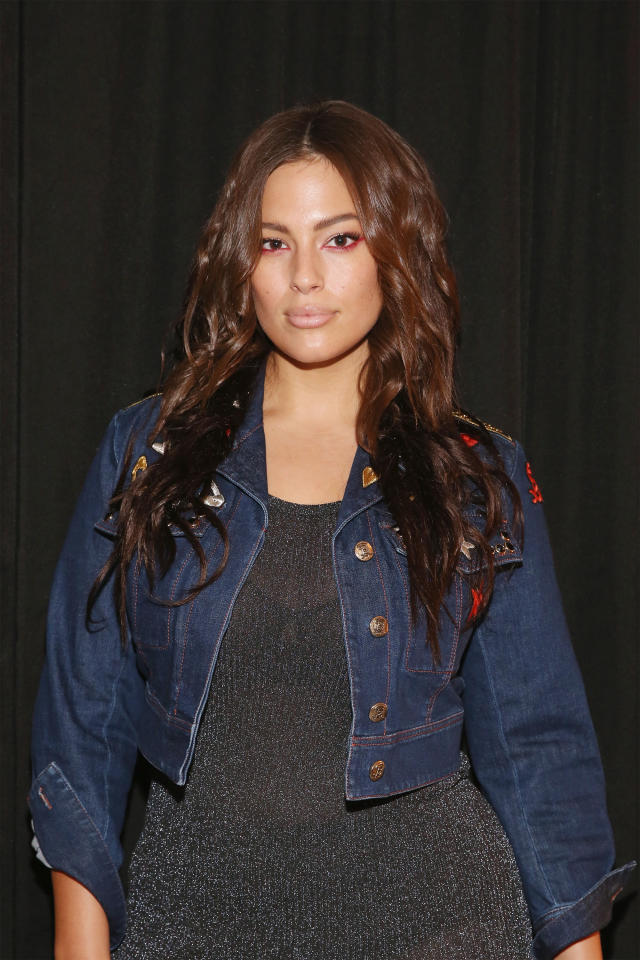 Ashley Graham embraces her style icon status in striped crop top and yellow denim  jacket | Daily Mail Online