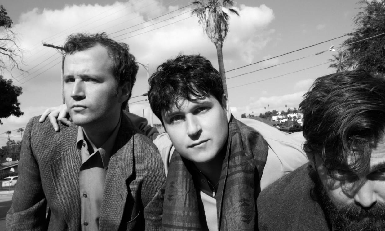 <span>‘Mortality looms large’: left to right, Chris Baio, Ezra Koenig and Chris Thomson of Vampire Weekend.</span><span>Photograph: Michael Schmelling</span>