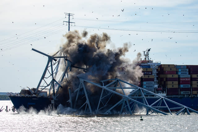 Images capture moment Baltimore bridge is blown apart in controlled explosion