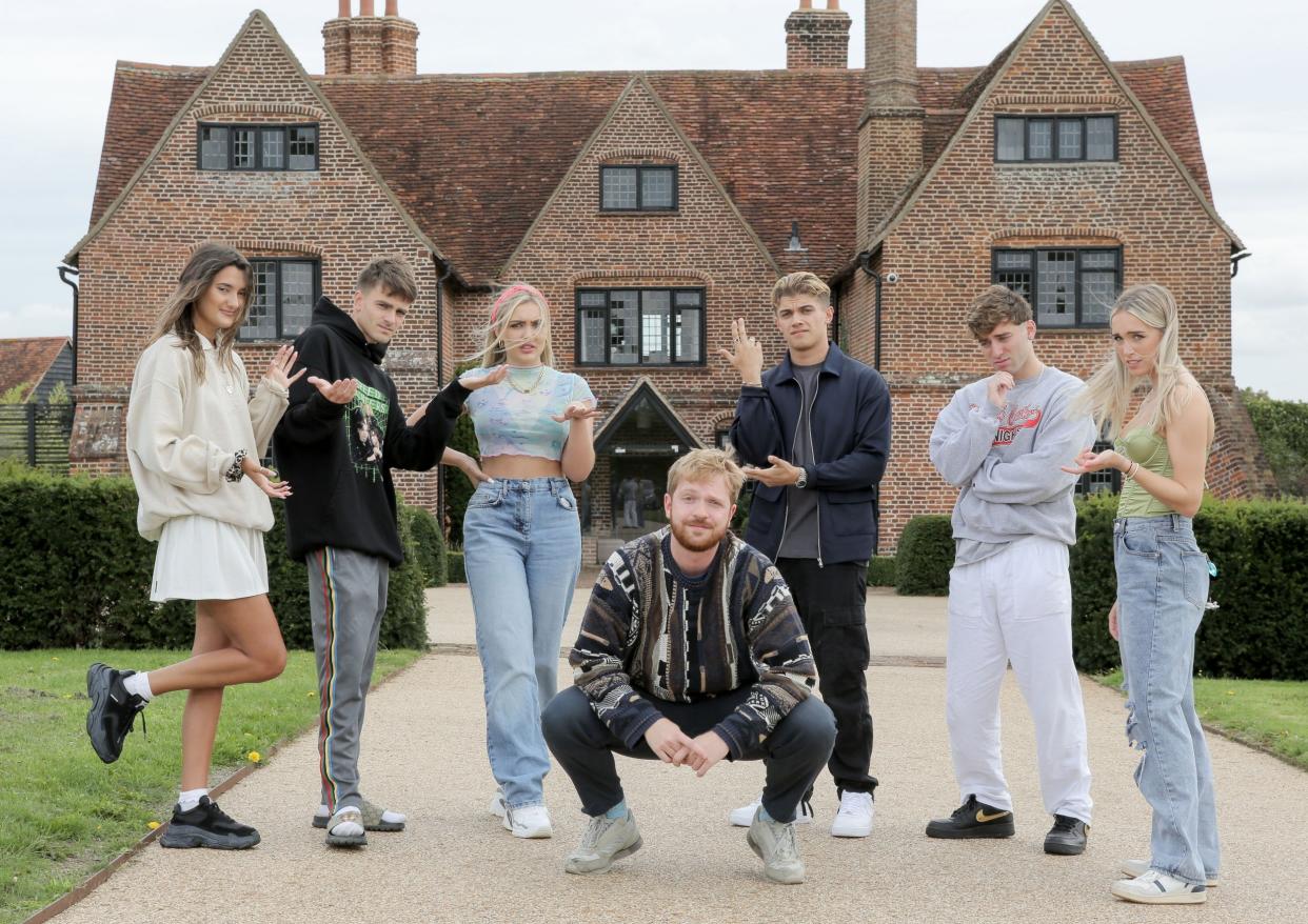 Good influence: Sam Fishwick, centre, at the TikTok House in Essex with, from left, content creators Eloise Fouladgar, Jimbo H, Millie T, Elmofilms, Touchdalight and Kate Elisabeth: Matt Writtle