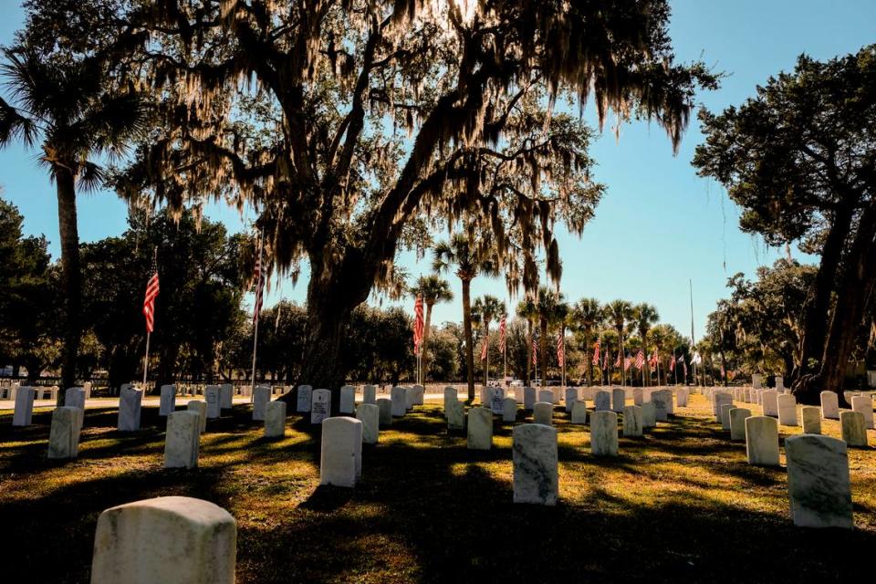American flags line the main road into Beaufort National Cemetery as seen on Tuesday, Nov. 9, 2021, in preparation for Veterans Day.