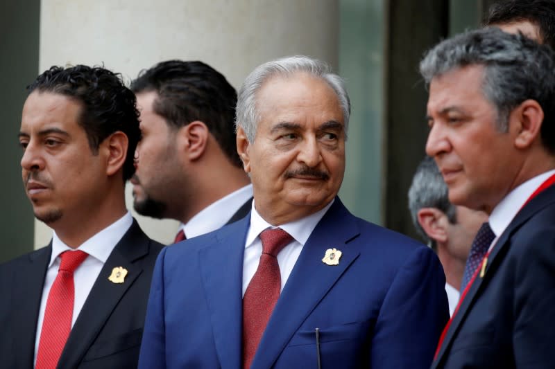 FILE PHOTO: Khalifa Haftar, the military commander who dominates eastern Libya, leaves after an international conference on Libya at the Elysee Palace in Paris