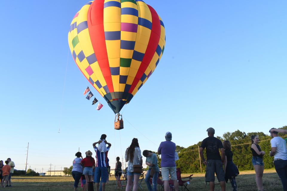 Hot air balloon pilot Bob Pulaski and his crew brought his balloon, the Ski Lift, to the field next to Huckleberry Brewing Company Saturday night and offered balloon rides for $10.