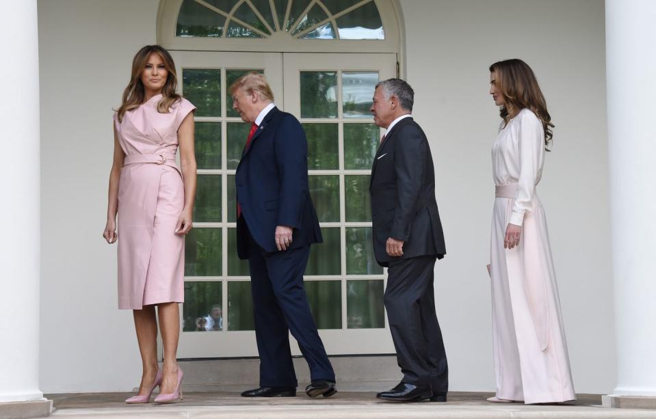 <p>Standing tall in sky high Manola Blahnik pumps, Melania sported a structured wrap dress that matched with the Queen of Jordan's outfit in late June 2018.</p>