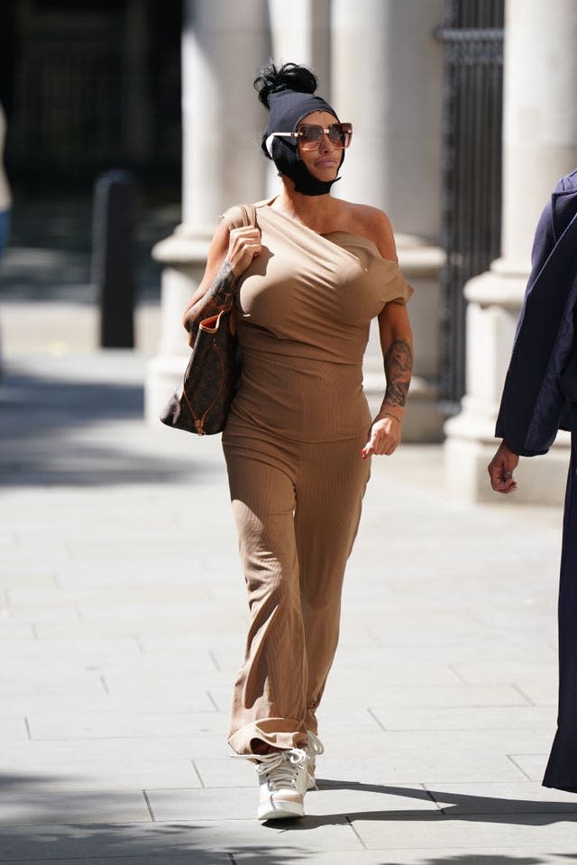 Former glamour model Katie Price arriving at the Royal Courts of Justice