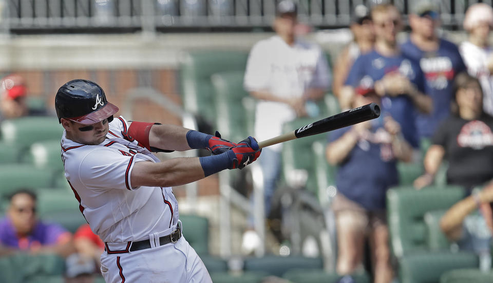 Atlanta Braves' Austin Riley swings for the game winning hit off Washington Nationals' Jordan Weems in the twelfth inning of a baseball game, Sunday, July 10, 2022, in Atlanta. (AP Photo/Ben Margot)