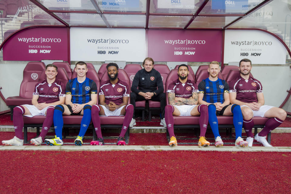 Manager Robbie Neilson (centre) with players, (left to right) Cammy Devlin, Ben Woodburn, Beni Baningime, Josh Ginnelly, Stephen Kingsley and John Souttar wearing Waystar Royco sponsored shirts 