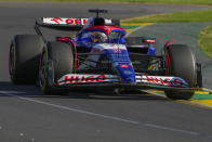 Daniel Ricciardo of Australia driver of RB, the team previously known as AlphaTauri steers his car during the second practice session of the Australian Formula One Grand Prix at Albert Park, in Melbourne, Australia, Friday, March 22, 2024. (AP Photo/Scott Barbour)