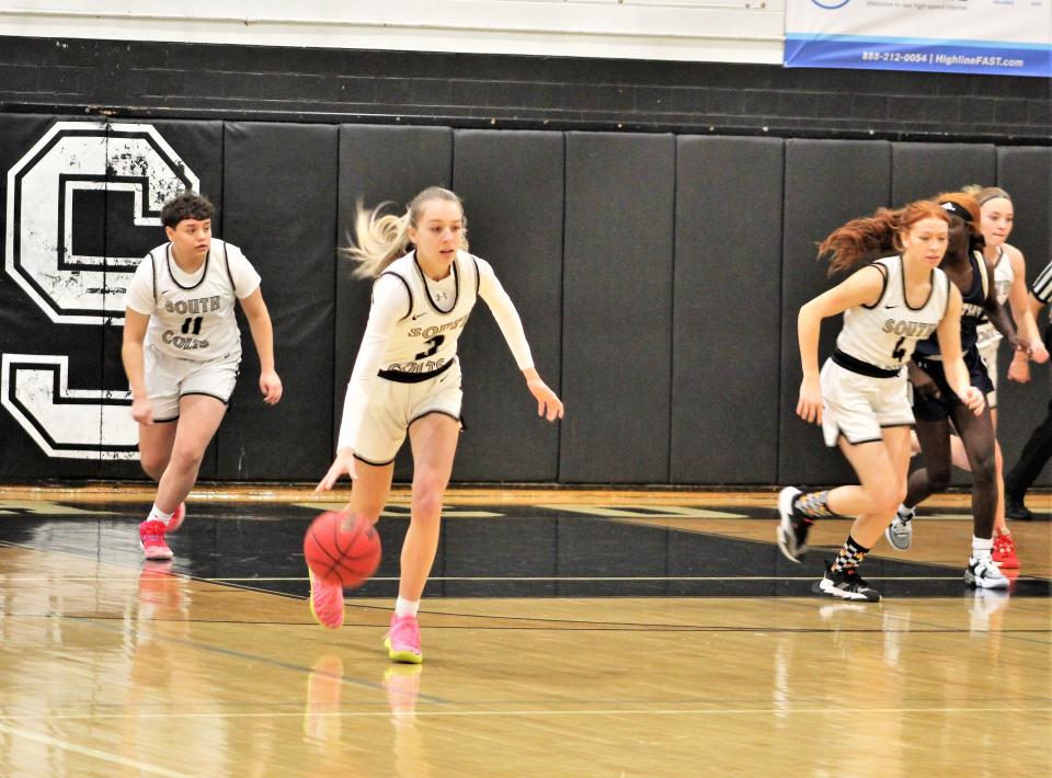 Pueblo South's Madison Bussey leads a trio of Colt's on a fast break in a game against Colorado Springs Christian at Pueblo South High School on Jan. 14, 2023.