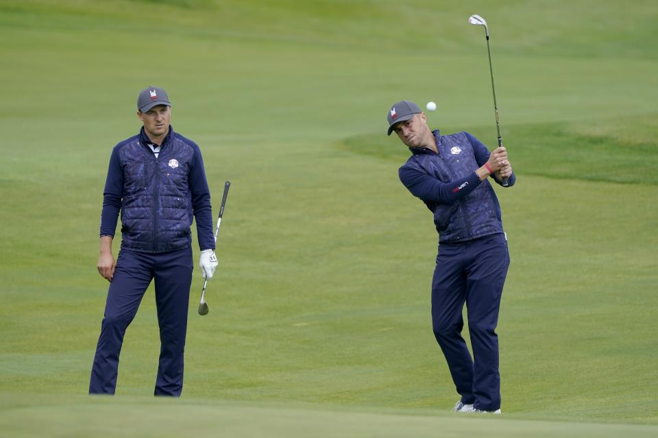 Team USA's Jordan Spieth watches a shot by Team USA's Justin Thomas during a practice day at the Ryder Cup at the Whistling Straits Golf Course Tuesday, Sept. 21, 2021, in Sheboygan, Wis. (AP Photo/Charlie Neibergall)