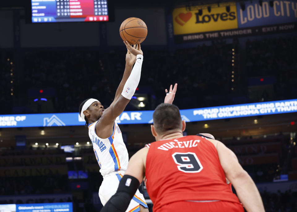 Nov 22, 2023; Oklahoma City, Oklahoma, USA; Oklahoma City Thunder guard Shai Gilgeous-Alexander (2) shoots against the Chicago Bulls during the second quarter at Paycom Center. Mandatory Credit: Alonzo Adams-USA TODAY Sports