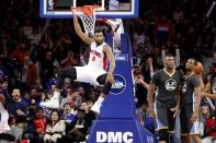 Jan 16, 2016; Auburn Hills, MI, USA; Detroit Pistons center Andre Drummond (0) hangs on the rim after a dunk during the fourth quarter against the Golden State Warriors at The Palace of Auburn Hills. The Pistons won 113-95. Mandatory Credit: Raj Mehta-USA TODAY Sports